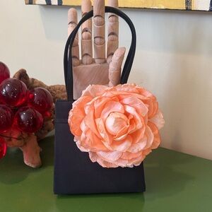 Lorren Bell black Clutch with a orange big flower  Dallas Texas